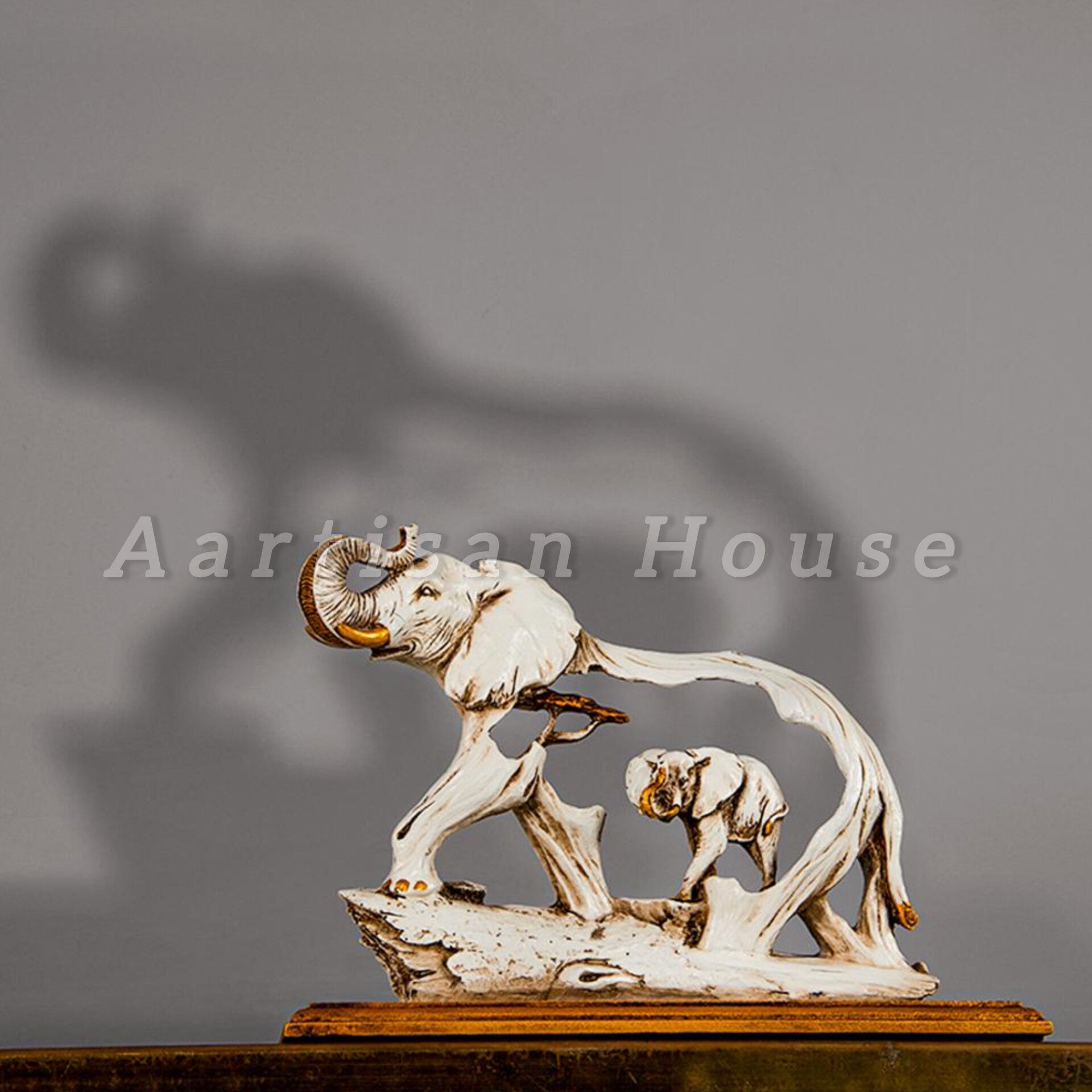 The Feng Shui Golden Elephant Showpiece with Wooden Base